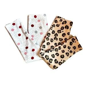 Pair of Carter's leggings, Size 6 color white with dots and animal print.